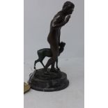 A late 19th century French bronze study of a nude female and a deer, indistinctly signed, raised