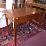 A 19th century mahogany card table, raised on tapered legs, H.74 W.91 D.46cm
