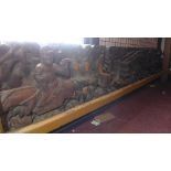 A large and impressive 18th/19th century Chinese intricately carved hardwood plaque, depicting