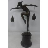 An Art Deco style bronze study of a dancer, raised on marble base, H.56cm