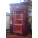 A 19th Century mahogany and satinwood inlaid glazed corner cabinet, with fitted pink interior, H.