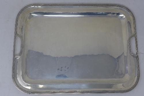 A Mexican silver tray with reeded border, stamped 900, 31oz