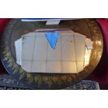 An Art Deco four panelled mirror, having bevelled glass plates, H.50 W.82cm