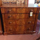 An early 19th century flame mahogany chest, with four graduating drawers, raised on square feet, H.