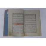 A mid-19th Century Persian Qujar period handwritten leather bound book, handwritten in Arabic, along