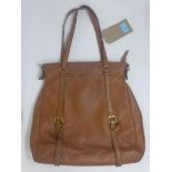 An Italian designer Prada handbag, in soft tan leather with strap handles, H.39 W.41cm