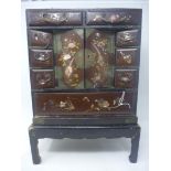 A late 19th century Japanese cabinet with abolone inlay, H.43cm W.29cm