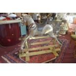 A Lines Bros. Ltd Sports Boy rocking horse, c.1930's, with rare saddle design, bears maker's mark,