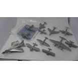 A collection of twelve modern pewter Danbury Mint collectors planes, to include Supermarine