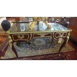 A Louis XV style king wood plat du jour desk, with single drawer, leather top, ormolu mounts, raised