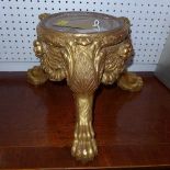 A 19th century carved gilt wood jardiniere stand, raised on claw feet, H.30cm