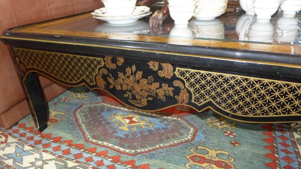 A large Drexel Heritage burr walnut and black lacquered square coffee table, with gilt floral - Image 2 of 2