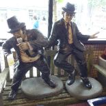 A pair of vintage fibreglass display models of the blues brothers, tallest H.102cm, damaged