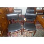 A set of four mid 20th century Danish designer rosewood dining chairs