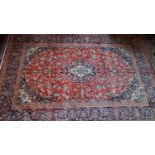 A fine Central Persian Kashan carpet, 290cm X 200cm. Central double pendent medallion with repeating