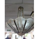 A large and impressive Art Deco style 12 light chandelier, with floral frosted glass slide in