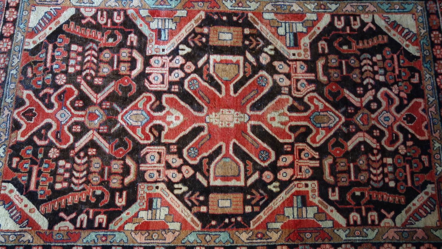 A fine North West Persian Hamadan rug, 201cm X 130cm. Repeating eagle motifs on a midnight field - Image 2 of 3