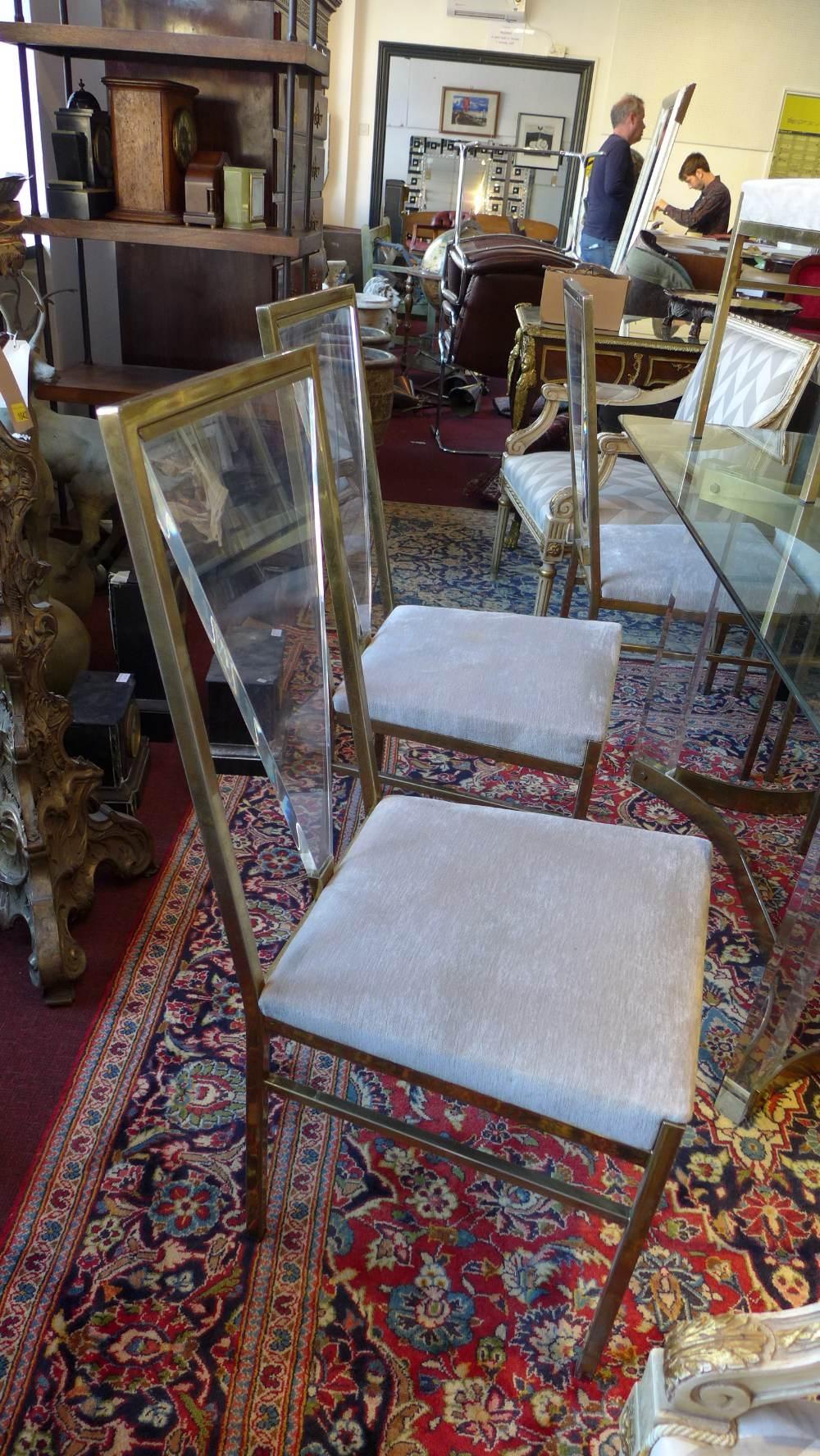 A 1970's Roche Bobois gilt metal and perspex dining table with glass top, together with eight - Image 5 of 5