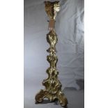 A large 19th century Rococo style silver plated altar pricket stick, embossed decoration, raised