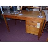 A mid 20th century Arne Vodder style Danish teak desk, with two drawers and drop leaf, H.72 W.115