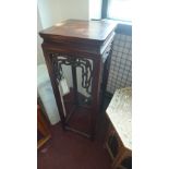 A late 19th century Chinese hardwood jardiniere stand, with padouk wood top, carved fret work, H.