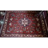 A fine Central Persian Isfahan rug, 210cm X 155cm. Central double pendent medallion with repeating