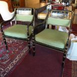 A pair of Drexel Heritage black lacquered armchairs, in the Chinoserie taste, with green damask