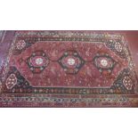 A South West Persian Qashqai carpet, 274cm x 170cm, triple pole medallion with petal and animal