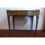 A French Louis XV style table a ecrire, the brass galleried parquetry top over a pull out leather