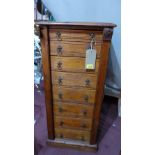 A 19th century oak Wellington chest, having eight drawers, H.100 W.44 D.32cm