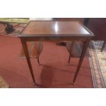 A 19th Century mahogany and inlaid side table, the galleried top over square tapering supports,