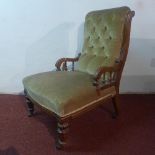 A Victorian mahogany chair, with button back velour upholstery, raised on turned legs and castors