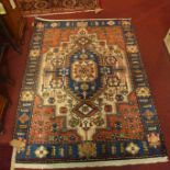 A North West Persian Nahawand rug, 183cm x 140cm, central diamond medallion on an ivory field with