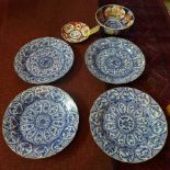 A collection of Oriental porcelain to include four blue and white chargers with marks to the base,