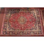 A North East Persian Meshad rug, 193cm x 145cm, central floral medallion with repeating spandrels on