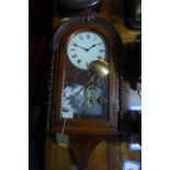A 19th century walnut eight day wall clock, painted round dial with Roman numerals, blued steel