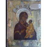 A Russian icon of the Mother of God and Christ, tempera on wood panel, with repousee oklad, H.51cm