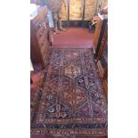 A Central Persian Kurk Kashan rug, repeating stylised pole medallion all over accompanied by a