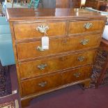 A 19th century walnut chest of two short, over three long drawers, raised on bracket feet, H.104 W.