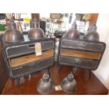 A set of six industrial copper ceiling light shades