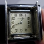 An Art Deco Cartier jet envelope watch, square dial with Arabic numerals