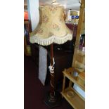 A 1940's mahogany standard lamp