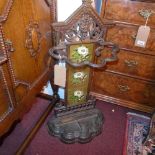 A Victorian cast iron stick stand, with tiled back, H.83 W.44 D.21cm