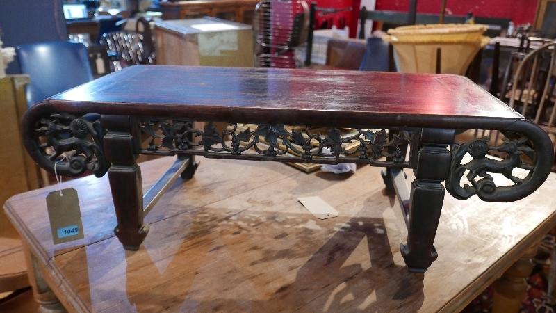 A 19th century Chinese hardwood table top altar table, with carved and pierced frieze, H.32 W.98 D.