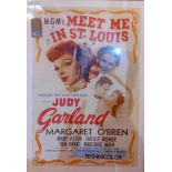 A reproduction film poster for 'Meet me in St Louis' starring Julie Garland, 101x66cm