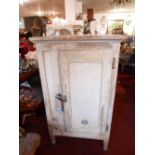 An early 20th century painted pine kitchen cupboard, with lead lining, H.104 W.63 D.53cm