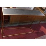 A contemporary gilt metal console table with slate top, H.70 W.100 D.25cm