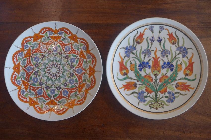 A pair of Turkish Iznik style plates, signed by Sumerbank, 1993, with enamel and gilt decoration,