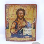 A Russian icon, Christ Pantocrator flanked by saints, tempera on wood panel, parcel gilded, 31 x