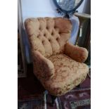 A pair of 20th century mahogany tub chairs, with button back floral upholstery (2)